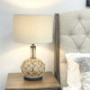 Coastal-style table lamp with natural rope