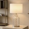 LLT Ariel White glass table lamp creating a soft calm glow with textured glass base and white shade