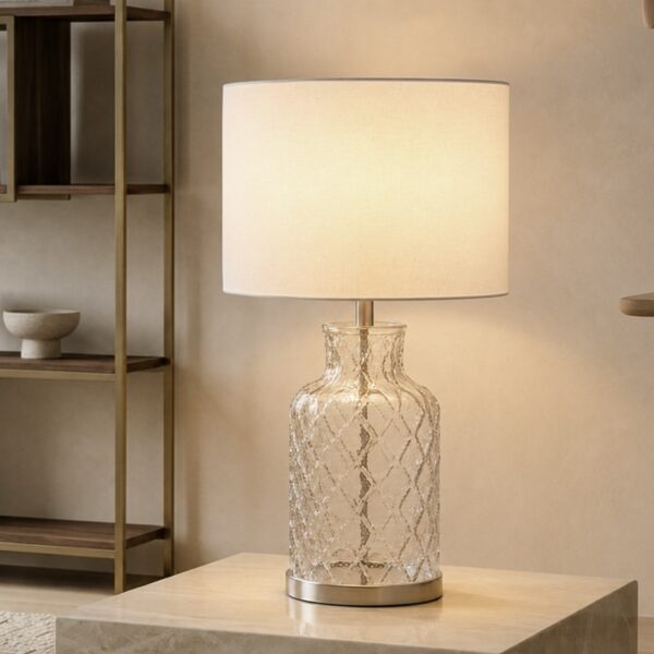 LLT Ariel White glass table lamp creating a soft calm glow with textured glass base and white shade