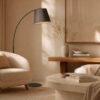 LLF Bowie Charcoal contemporary arc floor lamp styled in modern living room interior setting