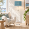 LLF Marilyn Blue contemporary floor lamp styled in modern living room interior setting
