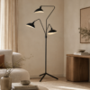 Floor Lamp with three black powder coated arms and white inner shades on tripod base