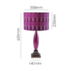 Modern decorative table lamp in black and magenta tones