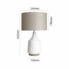 LLT Torquay Mini Natural Table Lamp with white pottery base and warm natural linen drum shade