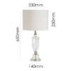 Elegant table lamp featuring white faux silk drum shade