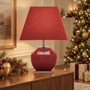 Chai red ceramic table lamp with a textured red tapered shade and chrome pedestal against a white background