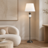 White Floor Lamp with black chrome stem and white ceramic globe accent and white satin shade