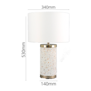 Modern terrazzo table lamp with gold accent and linen drum shade
