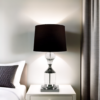 Modern black table lamp with crystal accent and chrome base