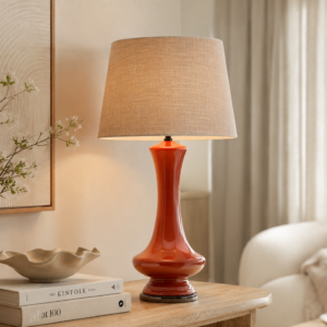 LLT Tanager Sand table lamp with burnt orange glass base, black chrome accents and sand textured tapered shade