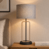 LLT Hamish Stone table lamp used in a contemporary living room with warm natural texture