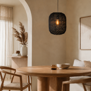 LLP Kona Pendant Light styled over dining table in dark contemporary interior with warm ambient lighting