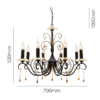 LLP Terrace 8LT pendant light close up showing ornate scrolled black iron arm with gold accent and amber crystal drop detail