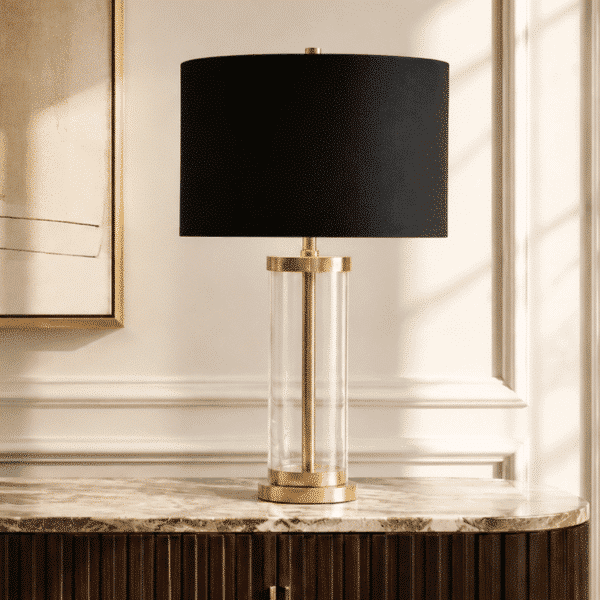 LLT Empire Black Table Lamp with brass finish and glass cylinder base and bold black linen drum shade