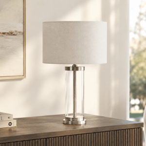 LLT Empire White Table Lamp styled on bedside table in clean Scandinavian bedroom interior with white and silver tones