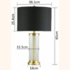 Glass cylinder table lamp with black shade