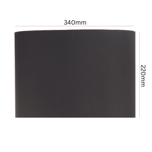 Bord Black Faux Silk Drum Lamp Shade styled on a table lamp on a console with neutral decor