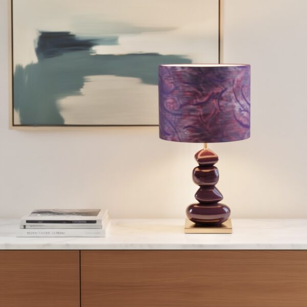 Sculptural purple lamp adding elegance to living room décor