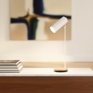 LLT Torcia White wireless charging lamp styled on a modern bedside table