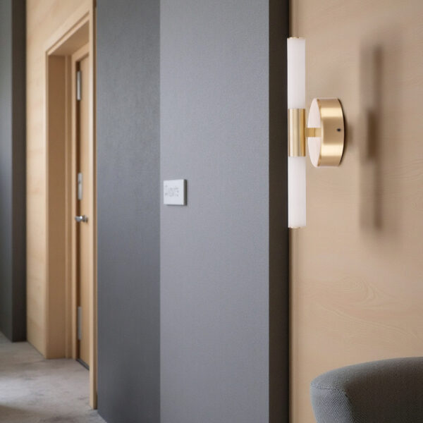 Modern brushed brass LED wall sconce for bathroom or hallway