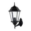 Vintage black exterior wall light with Victorian lantern design and clear glass panels on white background