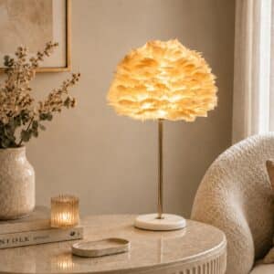Warm rose gold table lamp with soft natural feather light