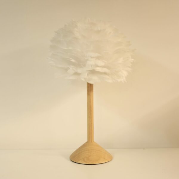 Feather shade bedside lamp with natural wood base