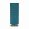 LLT Vardy Blue Table Lamp styled on bedside table in bright coastal bedroom interior with blue and neutral tones