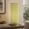 LLT Vardy Green Table Lamp styled on bedside table in fresh contemporary bedroom interior with green accent tones