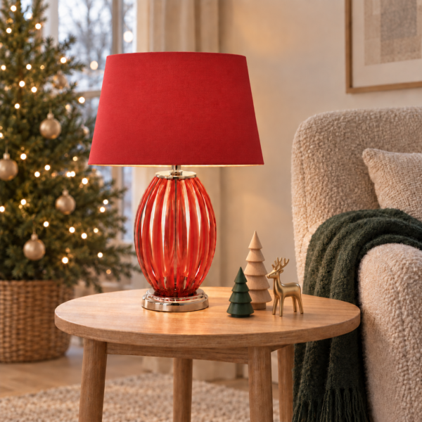 LLT Jimmy Red Linen Table Lamp styled on bedside table in bold contemporary bedroom interior with red accent tones